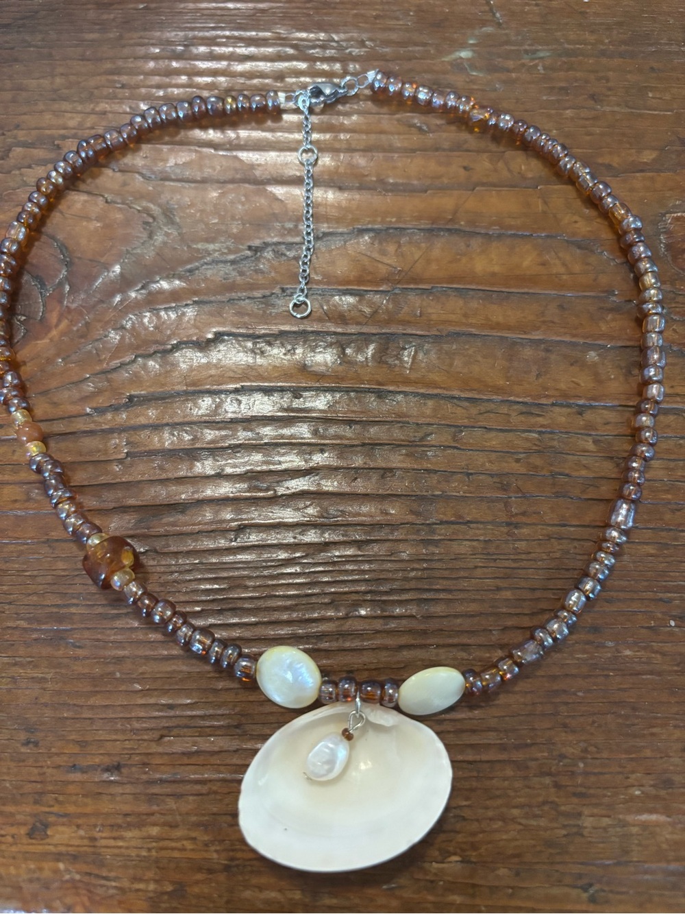 Handcrafted Brown Beaded Necklace with Shell Pendant
